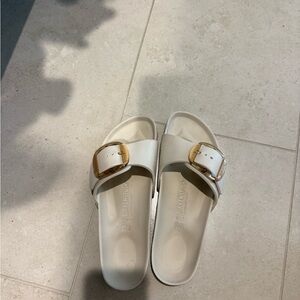 Birkenstock Off-White Sandals with Metallic Buckle
